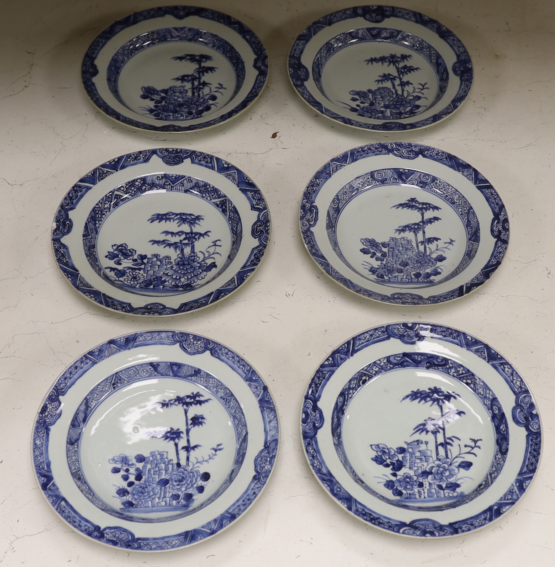A set of six 18th century Chinese export blue and white dessert dishes, 22.5cm